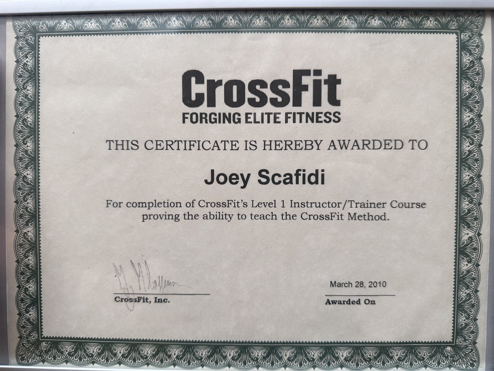 Joey Scafidi's framed CrossFit Level 1 Instructor certificate, awarded March 28, 2010